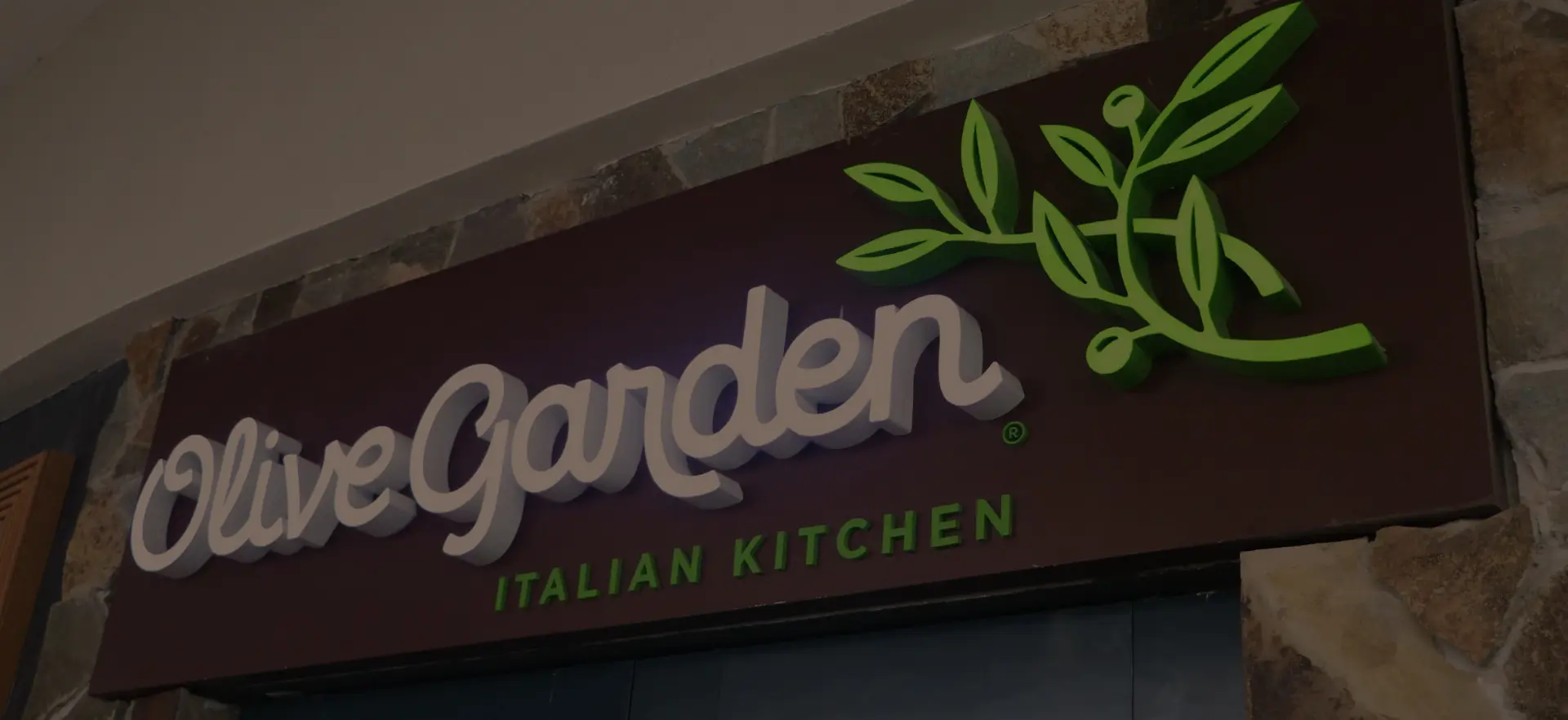 Olive Garden delivery bag with pasta and salad ready for curbside pickup